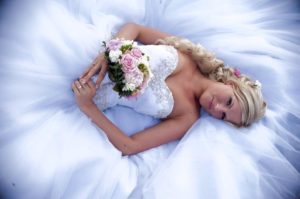 Fotografie nevěsty a svatební kytice